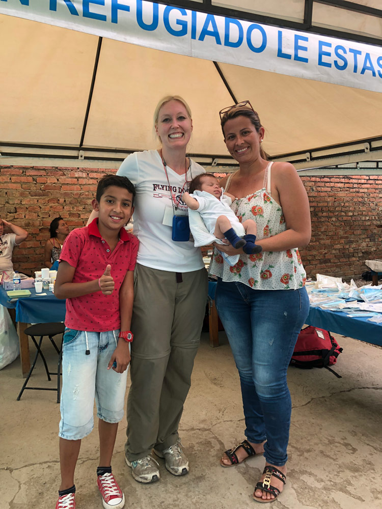 This woman wanted her photo taken with me after helping her son.